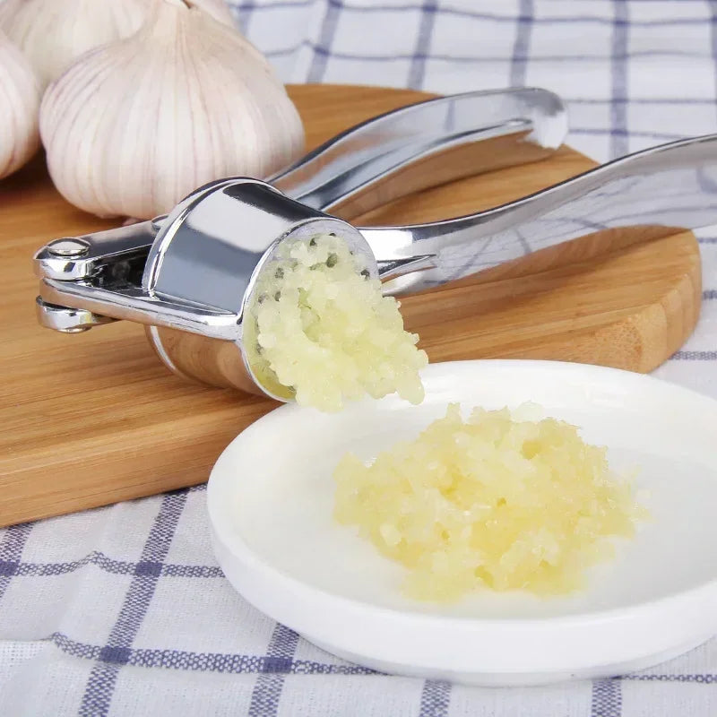 Espremedor de Alho de Aço Inoxidável para Cozinha.